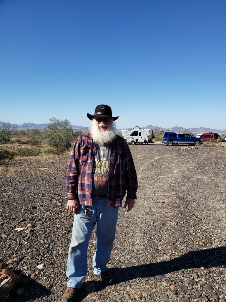 Gene with his trailer in the background