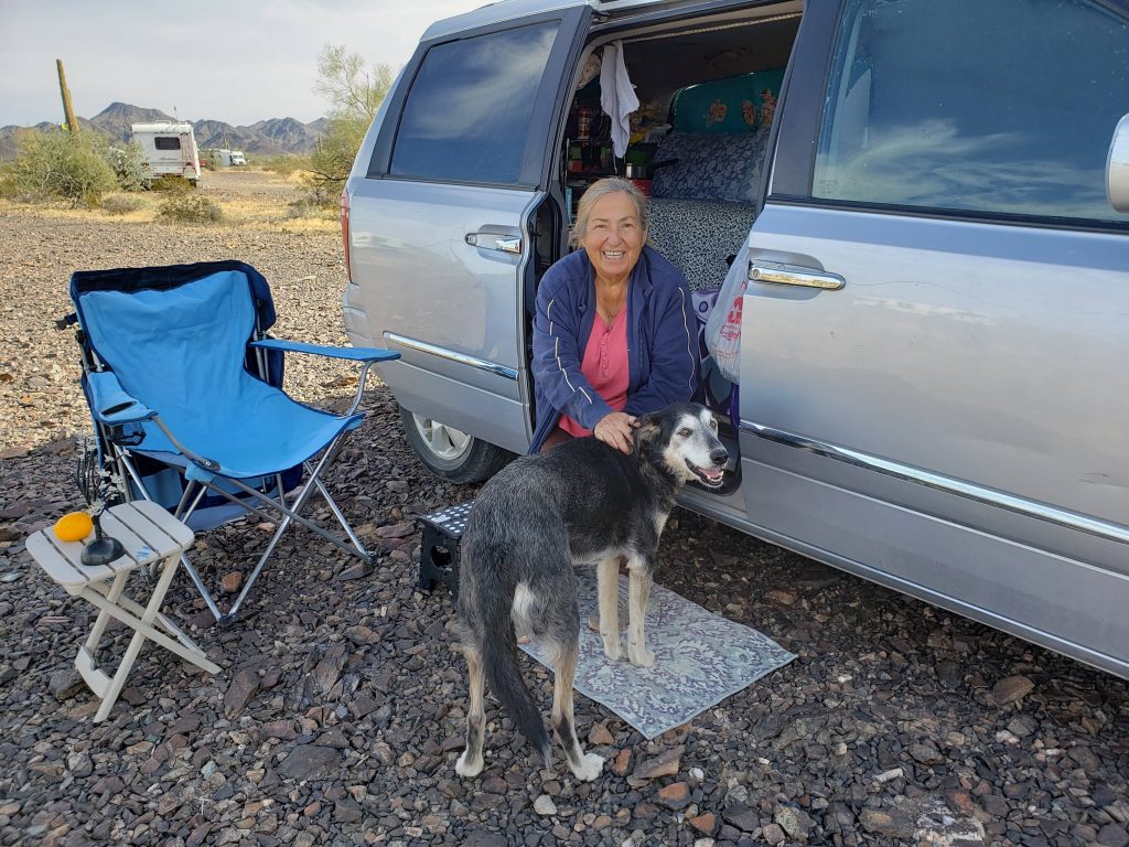 Gigi sitting in her van